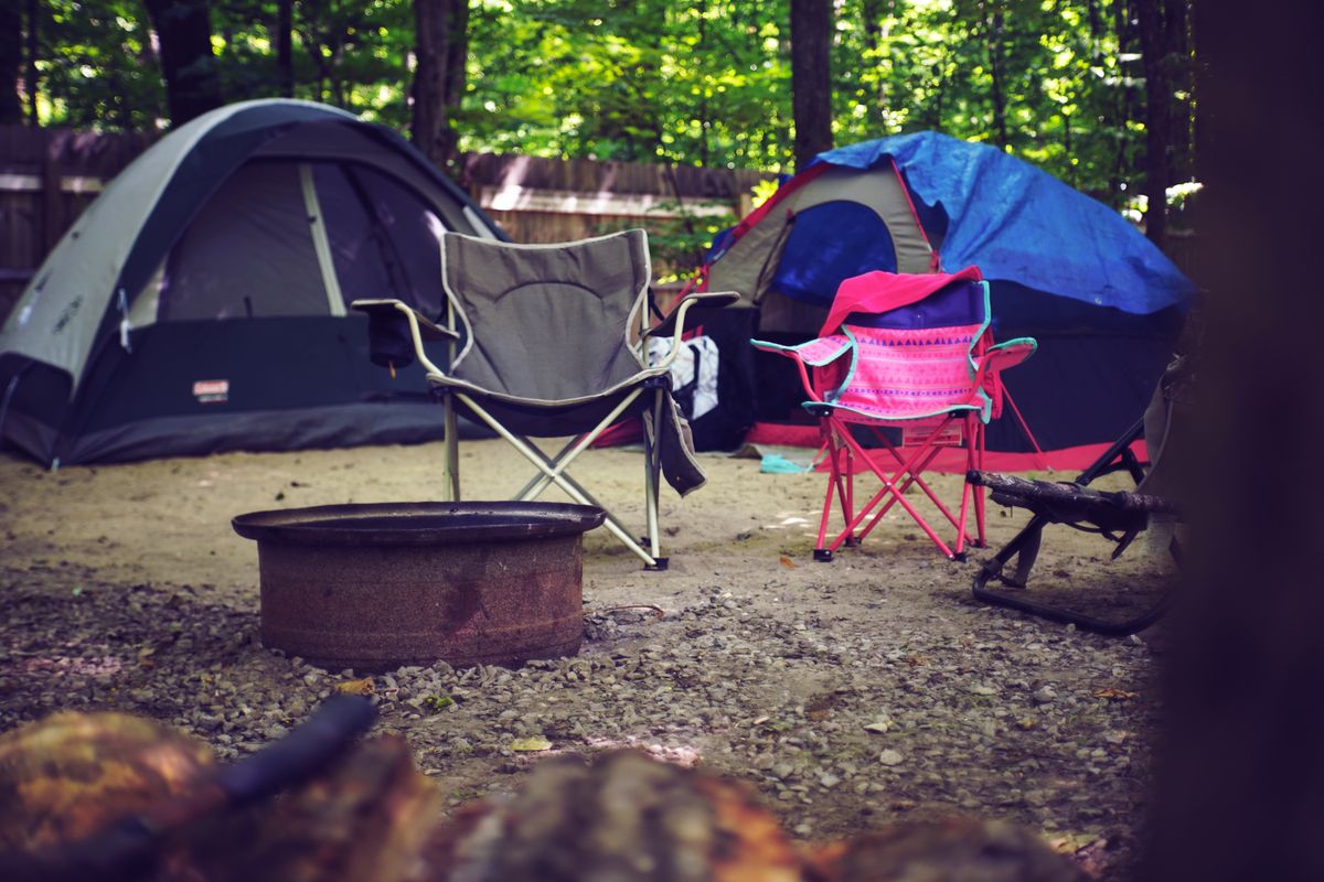 Practicing tent setup in backyard